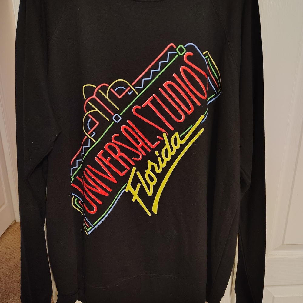 Universal Black Crewneck with Neon Logo